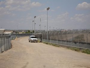 US-Mexico border fence near El Paso (public domain photo)